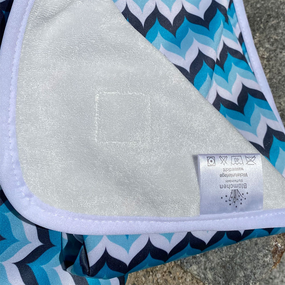 Blümchen Geschenkset Wickelunterlage + Wetbag