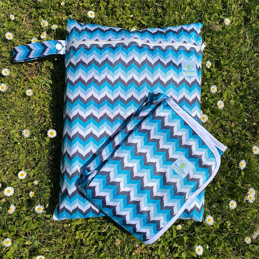 Blümchen Geschenkset Wickelunterlage + Wetbag