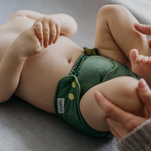 Baby mit Puppi Wollüberhose Green Herringbone