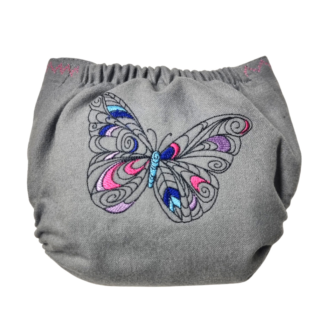 Doodush Wollüberhose Schmetterling