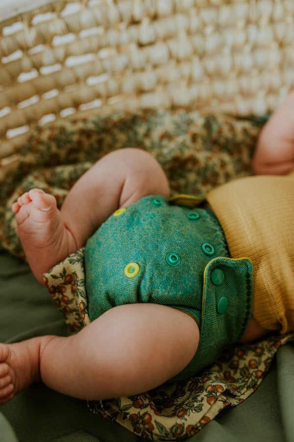 Puppi Wollüberhose Green Herringbone Newborn Snaps